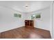 Bright bedroom featuring hardwood floors and good natural light from two windows at 1346 S Grant St, Longmont, CO 80501