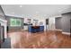 Spacious living room with hardwood floors, fireplace, and ample natural light at 1346 S Grant St, Longmont, CO 80501
