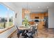 Cozy breakfast nook with stainless steel appliances and wood cabinets at 4704 Cedar Glen Pl, Castle Rock, CO 80109