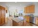 Charming kitchen with stainless steel appliances, granite countertops, and a view to the living area at 4704 Cedar Glen Pl, Castle Rock, CO 80109
