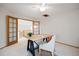 Bright office featuring a wood desk, modern chair, white carpet and glass paneled doors at 4704 Cedar Glen Pl, Castle Rock, CO 80109