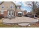 Stone patio with outdoor furniture, a grill, and a hot tub, perfect for entertaining in the backyard at 19113 E Fair Dr, Aurora, CO 80016