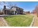 Spacious backyard showing the patio, and lawn at 9290 N Raleigh St, Westminster, CO 80031