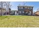 Expansive backyard featuring a patio, pergola, grill, lush lawn, and plenty of space for outdoor enjoyment at 9290 N Raleigh St, Westminster, CO 80031