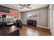 Bedroom featuring a wood ceiling fan, American flag art, and a display shelf with collectible vehicles at 9290 N Raleigh St, Westminster, CO 80031