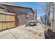 Long driveway leading to a detached garage with space for trailer storage at 9290 N Raleigh St, Westminster, CO 80031
