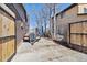 Long driveway leading to a detached garage with space for trailer storage at 9290 N Raleigh St, Westminster, CO 80031