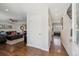 Open entryway showcasing hardwood floors, access to the living room, dining area, and a hallway with natural light at 9290 N Raleigh St, Westminster, CO 80031