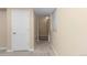 Basement hallway with carpet, leading to other rooms at 13953 E Princeton Pl # B, Aurora, CO 80014