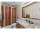 Clean bathroom with shower/tub combo and granite vanity at 13953 E Princeton Pl # B, Aurora, CO 80014