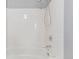 Close-up of the shower-tub area featuring white tile at 9328 Fenton Ct, Westminster, CO 80031