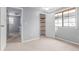 Bedroom with carpet, walk-in closet and window for natural light at 9328 Fenton Ct, Westminster, CO 80031