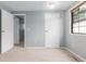 Bedroom with carpeted floors, neutral walls, and access to a closet and connected room at 9328 Fenton Ct, Westminster, CO 80031