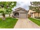 Charming home with a well-manicured lawn and a convenient one car garage at 9328 Fenton Ct, Westminster, CO 80031