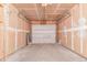 Unfinished garage with concrete floor and drywall walls ready for finishing at 9328 Fenton Ct, Westminster, CO 80031