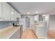 Well-designed kitchen with modern appliances and ample counter space with a view to the hall at 9328 Fenton Ct, Westminster, CO 80031