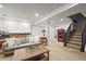 Finished basement living area with bar, and staircase visible at 9145 Sugarstone Cir, Highlands Ranch, CO 80130