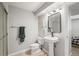 Clean and simple bathroom with a pedestal sink, toilet, and glass-enclosed shower at 9145 Sugarstone Cir, Highlands Ranch, CO 80130