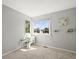 Cozy bedroom featuring natural light, neutral tones, and charming decor at 9145 Sugarstone Cir, Highlands Ranch, CO 80130