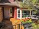 Charming deck with comfortable seating and a flower planter, perfect for outdoor relaxation at 9145 Sugarstone Cir, Highlands Ranch, CO 80130