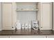 Coffee bar area with decorative white cabinetry and stylish fixtures at 9145 Sugarstone Cir, Highlands Ranch, CO 80130