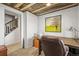 Office with a wooden ceiling, desk, and a glimpse of stairs at 9145 Sugarstone Cir, Highlands Ranch, CO 80130