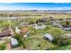 Large parcel with a home, outbuildings, and mountain views at 13805 W 82Nd Ave, Arvada, CO 80005