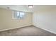 Bedroom with carpeted floor, single window, and closet at 13805 W 82Nd Ave, Arvada, CO 80005