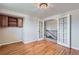 Home office featuring beautiful hardwood floors, cabinetry, and french doors at 13805 W 82Nd Ave, Arvada, CO 80005