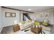 Comfortable living room with a sofa, area rug, and bright, natural light at 13805 W 82Nd Ave, Arvada, CO 80005
