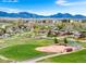 Cozy neighborhood with mountain views and proximity to green spaces and recreational areas at 13805 W 82Nd Ave, Arvada, CO 80005