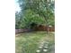 A spacious backyard offering ample space for recreation and relaxation in a serene setting at 1477 S Wright Ct, Lakewood, CO 80228