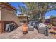 Relaxing backyard with outdoor furniture, a grill, and a hammock at 4560 Flanders Way, Denver, CO 80249