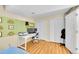 Comfortable bedroom features modern desk, monitors, and ample closet space at 4560 Flanders Way, Denver, CO 80249