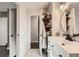 Main bathroom with vanity, linen closet, and stylish fixtures at 1945 W 102Nd Ave, Thornton, CO 80260