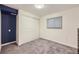 Simple bedroom with neutral walls, carpet, and large closet at 1945 W 102Nd Ave, Thornton, CO 80260