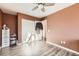 Spacious bedroom featuring wood floors and ample closet space at 1945 W 102Nd Ave, Thornton, CO 80260