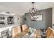 Kitchen with island, stainless steel appliances, and dining area at 1945 W 102Nd Ave, Thornton, CO 80260