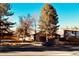 Exterior view of townhome with landscaping and street parking at 1945 W 102Nd Ave, Thornton, CO 80260