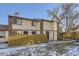 Attractive exterior of a townhome with a well-maintained yard and wooden fence at 1945 W 102Nd Ave, Thornton, CO 80260