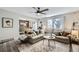 Cozy living room with a neutral color palette and fireplace at 1945 W 102Nd Ave, Thornton, CO 80260