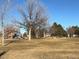 Community park with playground equipment and open green space at 1945 W 102Nd Ave, Thornton, CO 80260