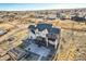 Home with patio, greenhouse, and expansive yard at 7587 Wright Ct, Arvada, CO 80005