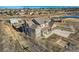 Aerial view of house, detached garage, and surrounding landscape at 7587 Wright Ct, Arvada, CO 80005