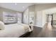 Bright bedroom with an ensuite bathroom and a private deck at 7587 Wright Ct, Arvada, CO 80005