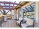 Outdoor deck with lounge seating and views of the surrounding landscape at 7587 Wright Ct, Arvada, CO 80005