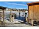 Two goats in snowy enclosure near a wooden structure at 7587 Wright Ct, Arvada, CO 80005