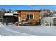 Goat enclosure with wooden structure and goats at 7587 Wright Ct, Arvada, CO 80005