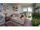 Cozy living room with a balcony, perfect for relaxing and enjoying outdoor views at 865 S Quebec St # 302A, Denver, CO 80247
