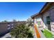 Balcony view from above shows greenery and the surrounding building at 865 S Quebec St # 302A, Denver, CO 80247